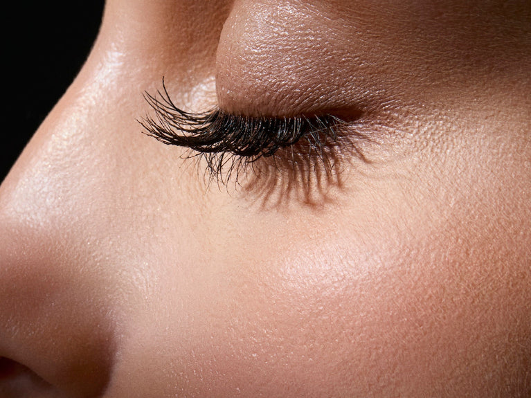 model wearing length define tubing mascara