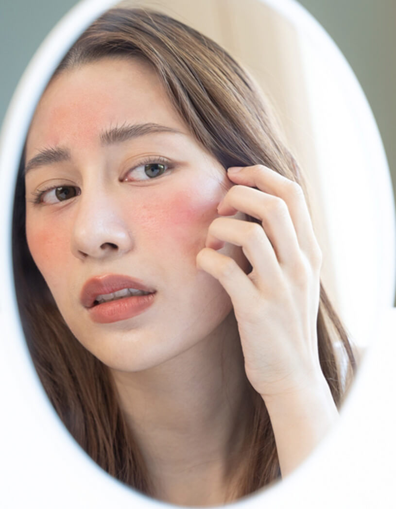 model in distress looking at reflection