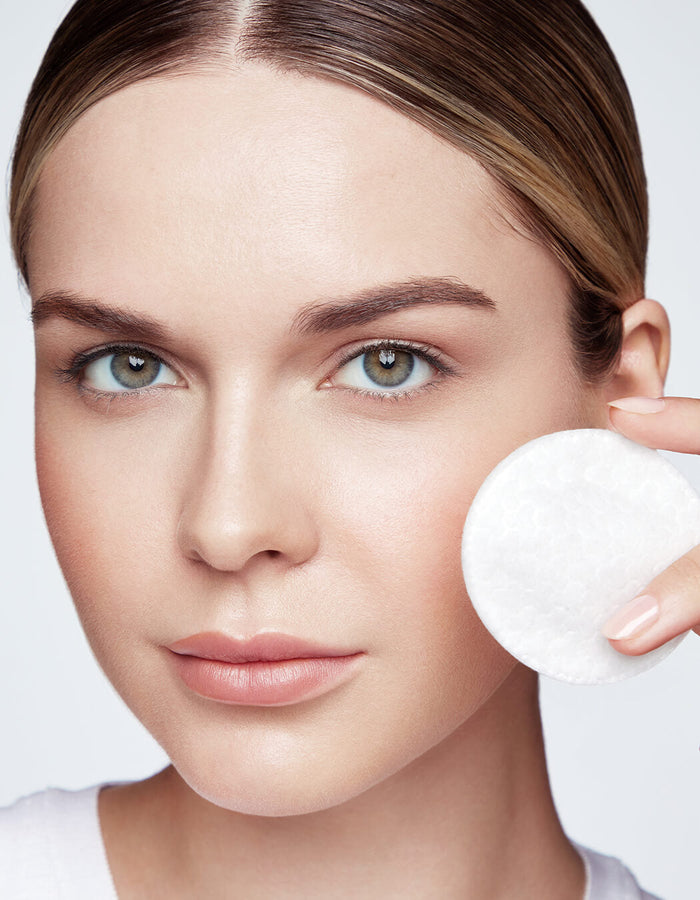 model cleansing eye with cotton round